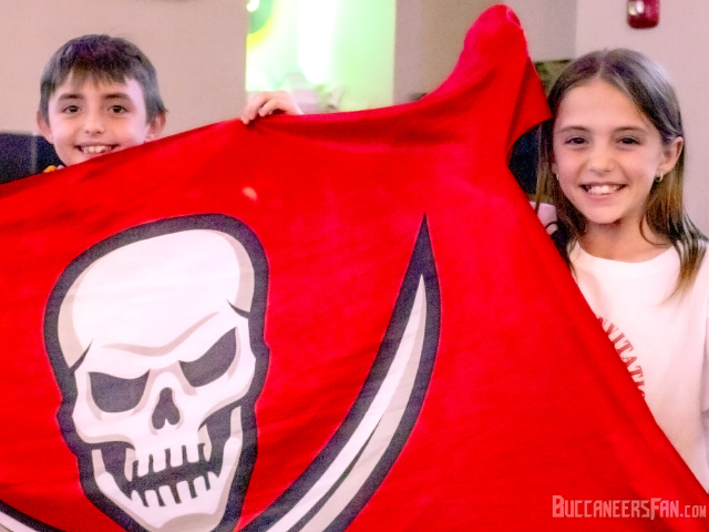 Rock & Brews Super Bowl Watch Party in Wesley Chapel was a family experience as this Brother & Sister Raise the Flag for the Buccaneers victory!