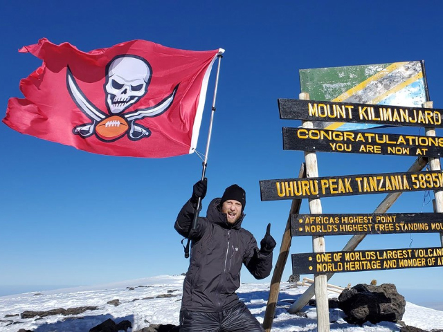 BuccaneersFan.com Rick Clark, from Sarasota a Bucs fan his whole life, raised his Bucs flag 19,341 feet at Mount Kilimanjaro summit.
